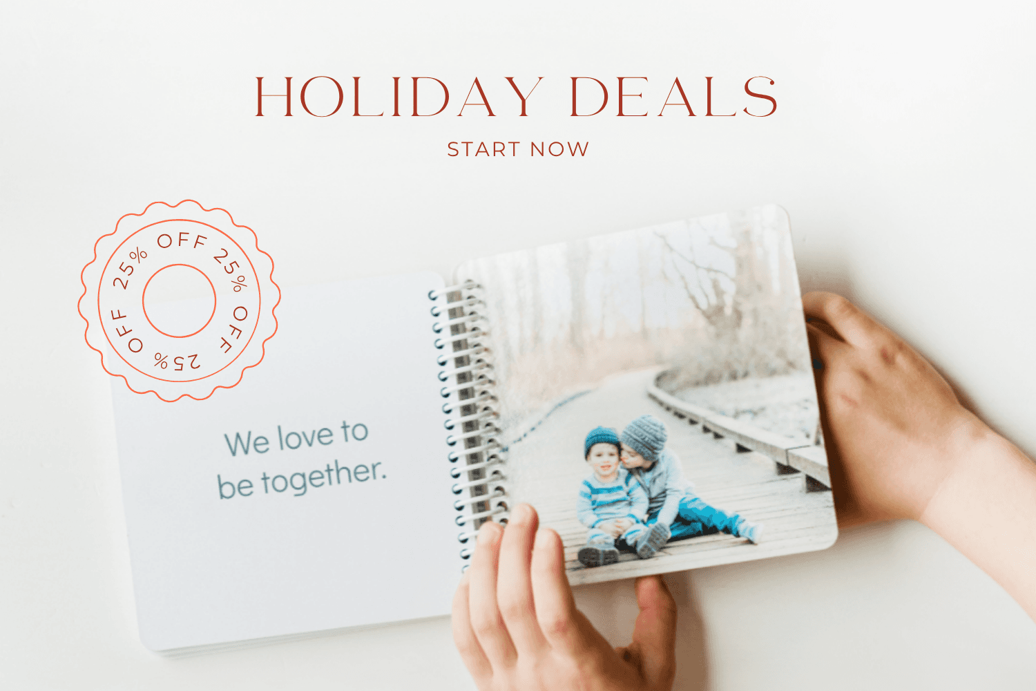 Child’s hands holding a personalized photo board book of two siblings, with a 25% off early holiday deals badge